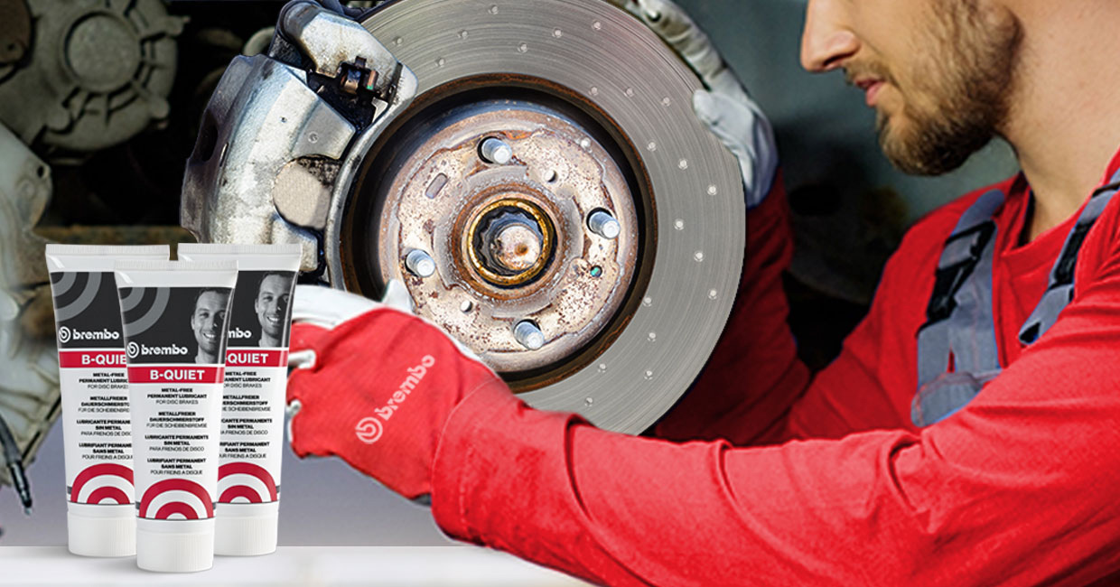 Brake caliper maintenance performed by a technician using Brembo B-QUIET
