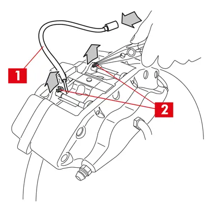 Disconnection of the wear indicator cable and removal of safety split pins