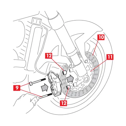 The disc braking surface is cleaned and the spacers are fitted.