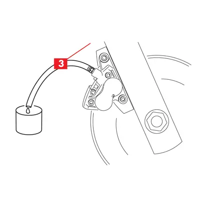 A hose and container is connected to the bleed plug on the caliper.