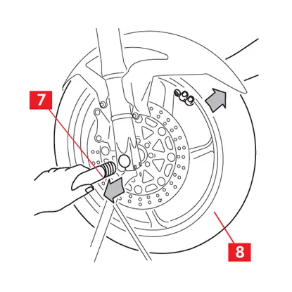 L’axe est déposé et la roue est légèrement levée.