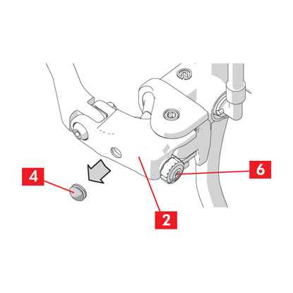 Kauçuk başlık, kol üzerine geri yerleştirilir ve kol-tutacak mesafesini ayarlamak için düğme çevrilir.